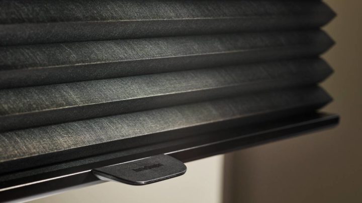 Hunter Douglas black window treatments in a bedroom near Galena, IL
