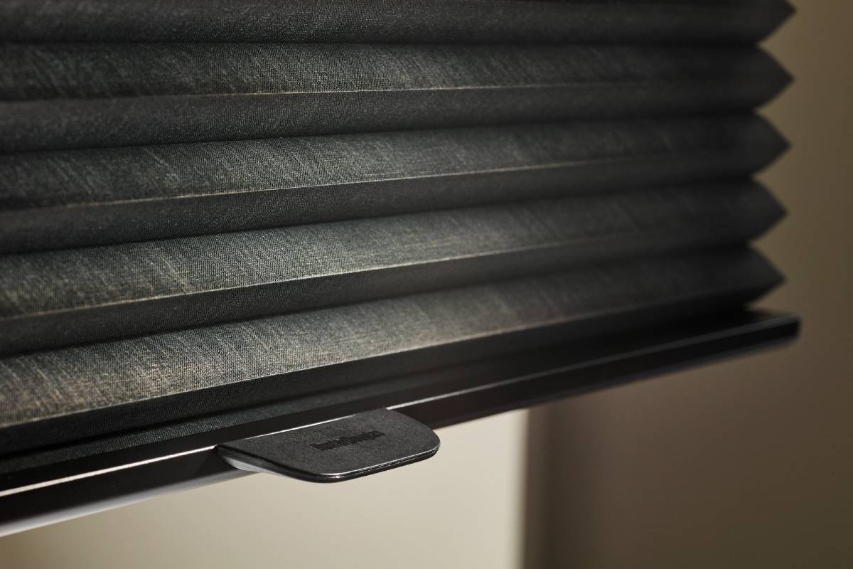Hunter Douglas black window treatments in a bedroom near Galena, IL